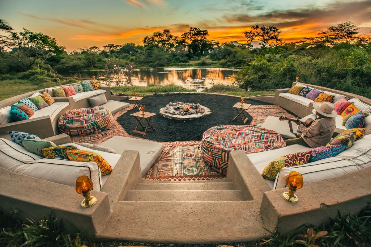 Evening around the campfire at a Mara camp